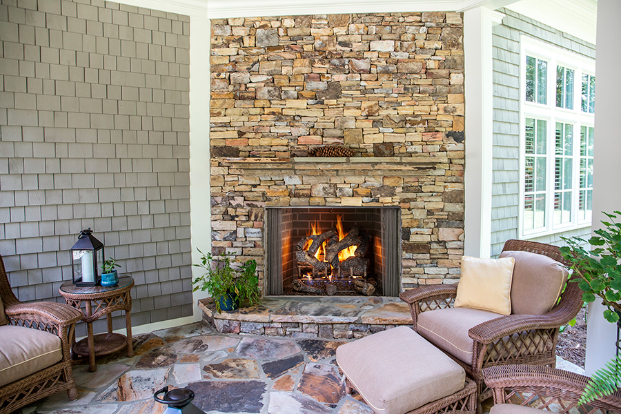 Outdoor cottage wood fireplace