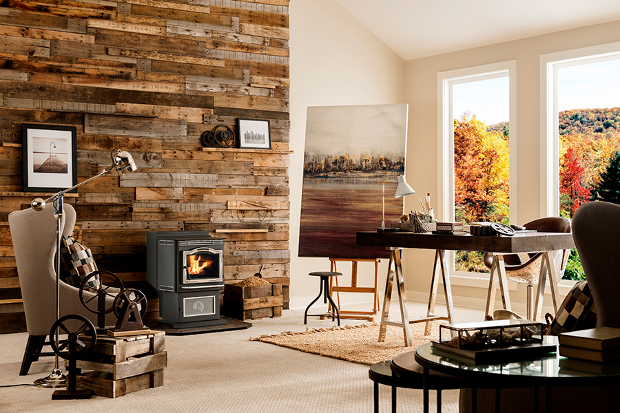 Pellet stove with wood wall backing